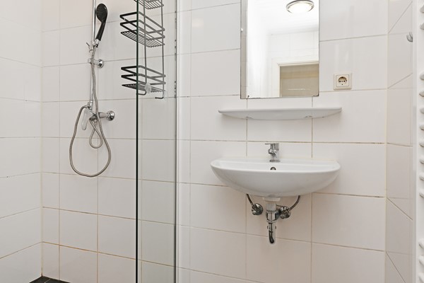 Medium property photo - Deimanstraat 309, 2522 BK Den Haag